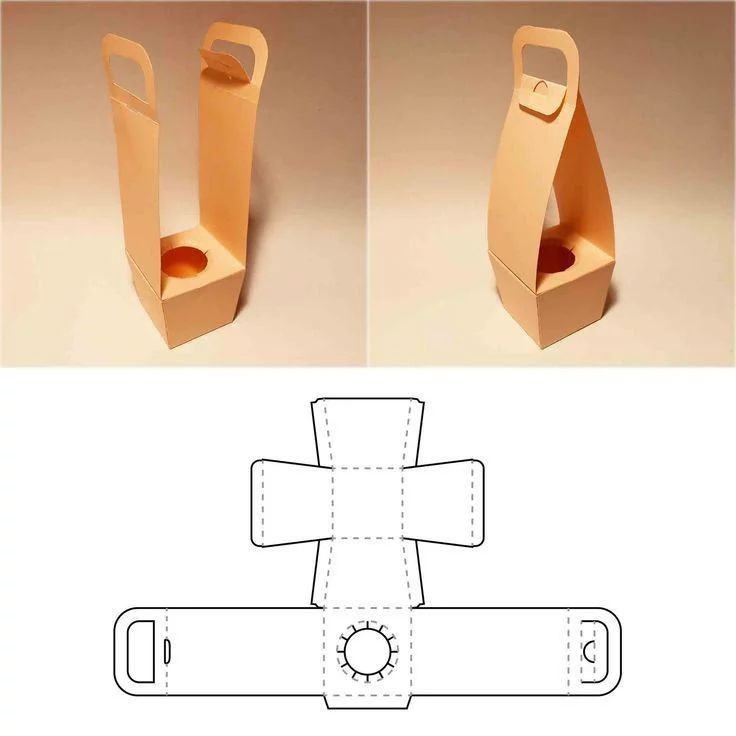 Paper-craft wine carrier assembled from a flat fold-pattern cut from a PhotoCAD vector.
